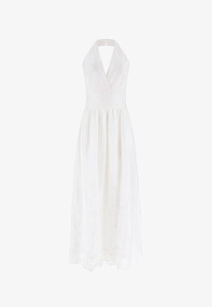 Vestito bianco senza maniche con scollo halter a V profondo, vita aderente e dettagli in pizzo ricamato su gonna e orlo.