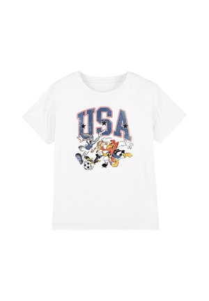 White t-shirt with large USA letters and cartoon characters playing soccer below the text.