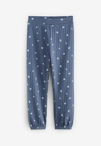 Collant blu a coste con un motivo floreale in azzurro chiaro. Presenta una vita elastica e polsini affusolati. Tessuto morbido.