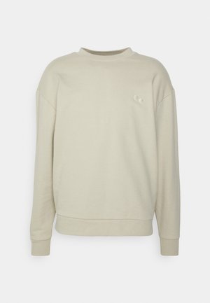 Beiger Sweatshirt mit Rundhalsausschnitt und langen Ärmeln, Rippbündchen und Saum, mit zwei kleinen beige bestickten Punkten auf der linken Brust.