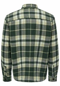 Camisa a cuadros verde y negra hecha de una tela texturizada, con un collar plegable y puños abotonados. La parte trasera presenta un diseño de yugo.