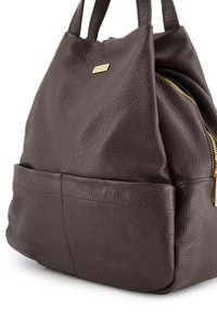 Brown textured leather handbag with a zippered side pocket, gold hardware accent, and dual handles for carrying convenience.