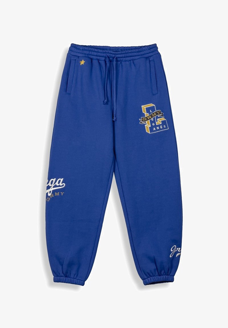 Blauwe fleece joggingbroek met elastische tailleband en boorden, voorzien van gouden bedrukte logo's, een steraccent en een gladde textuur.