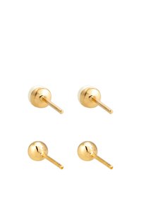 Gold-tone stud earrings with smooth white and round accents. Two pairs feature different designs: one smooth disc and one round shape.
