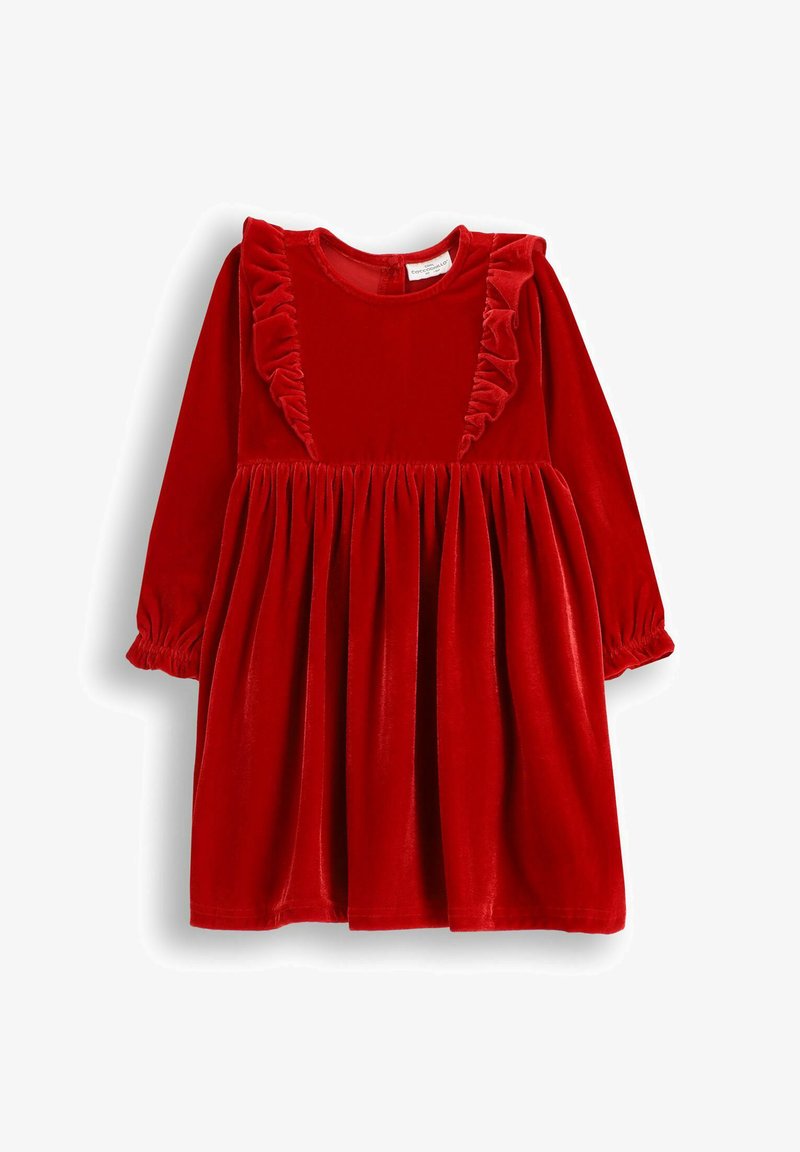 Czerwona sukienka z weluru z długimi rękawami, falbaną przy dekolcie i marszczoną spódnicą. Miękka tekstura z elastycznymi mankietami i okrągłym dekoltem.