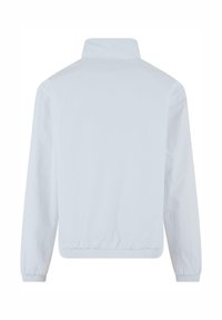 Light blue windbreaker jacket with a high collar, elastic cuffs, and waistband. Smooth texture, no visible patterns or hardware details.