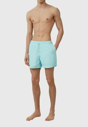 Light blue swim shorts made of lightweight fabric, featuring an elastic waistband and drawstring, with a relaxed fit and above-knee length.