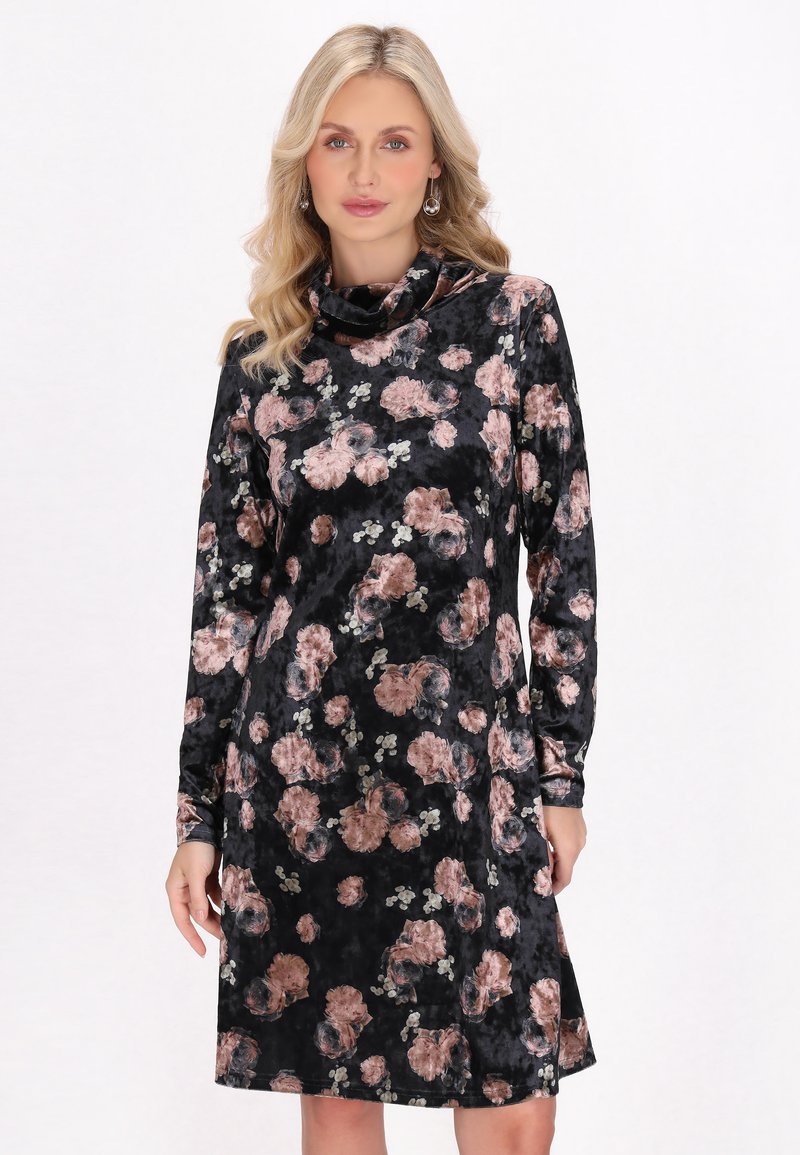 Abito in velluto nero con maniche lunghe, collo a drappo e stampa floreale in rosa e verde. Forma semi-adattata, design al ginocchio.