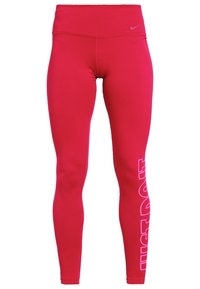 Leggings rouges ajustés en tissu extensible, avec une taille haute et le texte "JUST DO IT" en blanc sur la jambe gauche.
