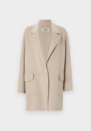 Beige jas van een wolmix met een reverskraag, lange mouwen en twee voorzakken. Heeft een knoopsluiting en een minimalistisch ontwerp.