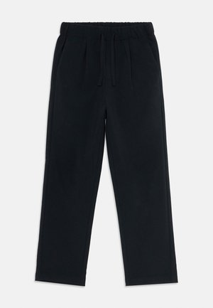 Pantalons noirs à jambe droite avec taille élastique et cordon de serrage, dotés de poches latérales, présentés sur un fond blanc.