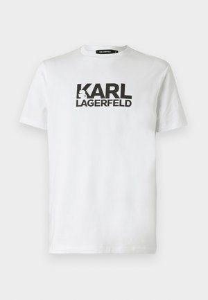 Valge puuvillane T-särk, mille esiküljel on suur must "KARL LAGERFELD" logo, ümmargune kaelus ja lühikesed varrukad. Lihtne disain.