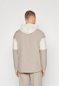 adidas Golf ULTIMATE365 - Windbreaker - putty beige