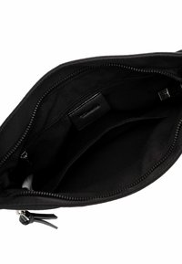 Black fabric bag with a zip closure, interior divided into compartments, smooth texture, and a leather accent label.