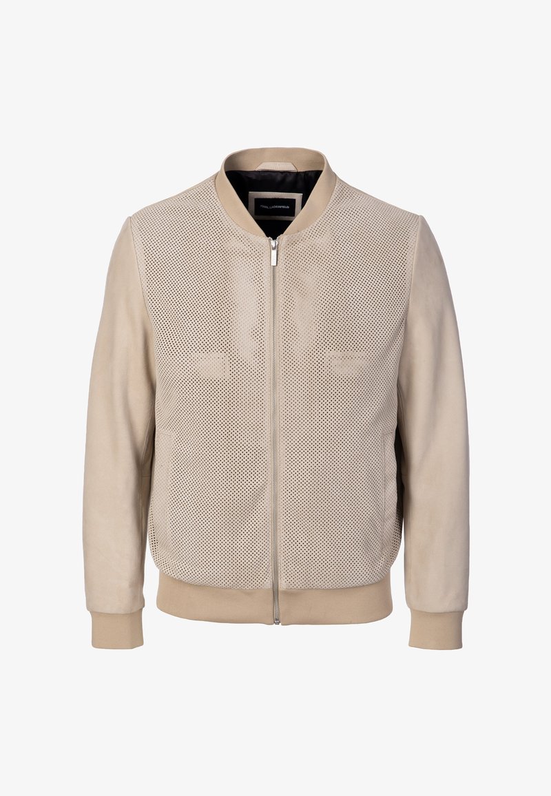 Veste bomber beige avec panneaux avant perforés, manches unies, col, poignets et ourlet côtelés, et fermeture éclair frontale.