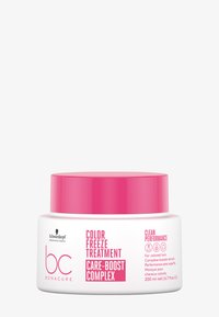 Vitt runt burk med rosa lock. Etiketten visar "Color Freeze Treatment" och "Care-Boost Complex", med grafik och detaljer i rosa och svart.