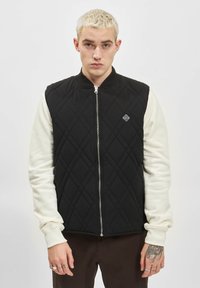 UNFAIR ATHLETICS HERREN UNFAIR ATHLETICS QUILTED MOSAIC VEST - Dūnu jaka - black
