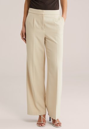 WE Fashion Nadrágok - beige
