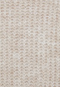 Tissu tricoté beige clair avec un motif tissé texturé. Apparence douce et duveteuse, composée de fibres variées et de subtiles variations de couleur.