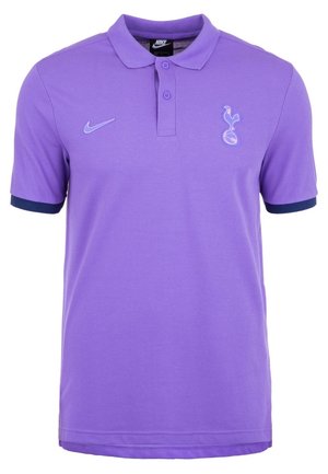 Polo violet Nike avec logo Tottenham Hotspur sur la poitrine, deux boutons et poignets de manches bleu marine foncé.