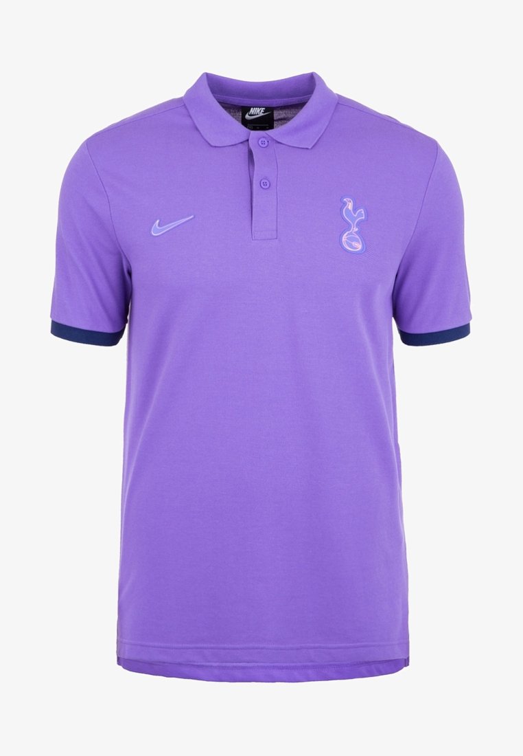 Polo violet Nike avec logo Tottenham Hotspur sur la poitrine, deux boutons et poignets de manches bleu marine foncé.