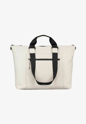 Sac fourre-tout couleur crème avec poignées noires, poche zippée avant et texture douce et lisse sur fond blanc uni.