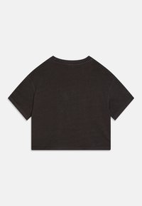 T-shirt en coton noir, coupé, avec manches courtes, col rond et couture standard. Design uni sans graphiques ni motifs.