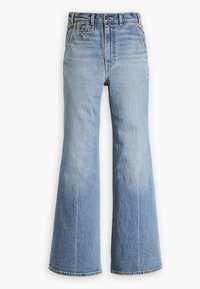 Hellblaue, ausgestellte Jeans aus Denim mit hoher Taille. Verfügt über ein Fünf-Taschen-Design, Kontrastnähte und einen allmählichen Farbverlauf bis zum Saum.