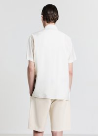 Calliope CON TASCA - Camicia - bianco lana