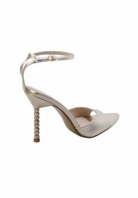 Sandalo beige con tacco alto, cinturino alla caviglia e tacco a stiletto decorato con perline, punta aperta e parte superiore in pelle liscia.