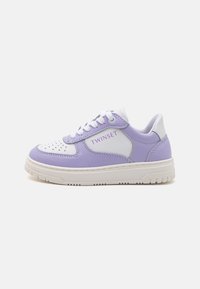 Purple and white sneakers with a perforated toe, smooth leather upper, laces, and logo detail on the side, paired with a textured white sole.