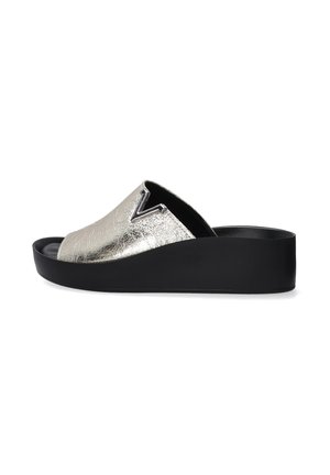 Metallic silver slide sandal with a v-shaped cutout, a textured upper, and a black platform sole. Low-profile design suitable for casual wear.