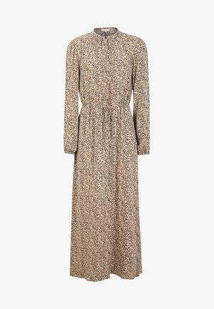 Robe longue en tissu beige avec motif abstrait noir, manches longues, taille froncée et encolure ronde. Texture lisse et coupe fluide.