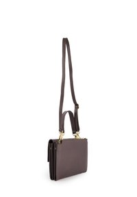 Brown leather handbag featuring dual handles, a detachable strap, and gold-tone hardware. Compact design with a zippered main compartment and side pocket.