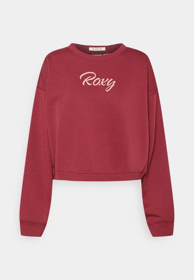 Bordeauxfärgad kort sweatshirt med långa ärmar och "Roxy" broderat i ljusrosa bokstäver över bröstet.