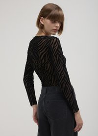 Calliope FLOCK FAN1 SC69 - Blouse - une variante