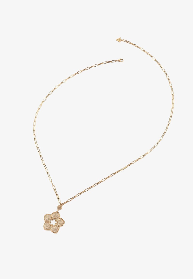 Złoty naszyjnik z kwiatowym wisiorkiem o fakturowanym wzorze, na łączonym łańcuszku. Wisiorek ma pięć płatków i centralny detal w postaci wycięcia.