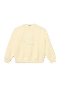 Felpa gialla chiaro realizzata in tessuto morbido, con collo a giro, maniche lunghe e logo "Calvin Klein Jeans" in rilievo sul davanti.