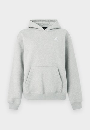 Grijze katoenen hoodie met een kangoeroezak, een capuchon met trekkoord en een wit Jordan-logo op de linkerborst. Voorzien van geribbelde boorden en zoom.