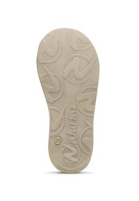Plantilla de goma beige con un patrón de logotipos circulares en relieve y el nombre de la marca "Naturino", presentando una forma redondeada y una superficie texturizada.