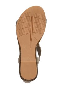 Bruine sandaalzool met een gestructureerde rubberen grip. Heeft een beige tussenzool en een lichte kromming, maat gemarkeerd als 37.