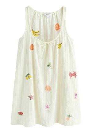 Biele šaty bez rukávov s farebnými vyšívanými letnými motívmi vrátane banánov, slnka, paliem, kraba, morskej hviezdice, melóna a ananásu.