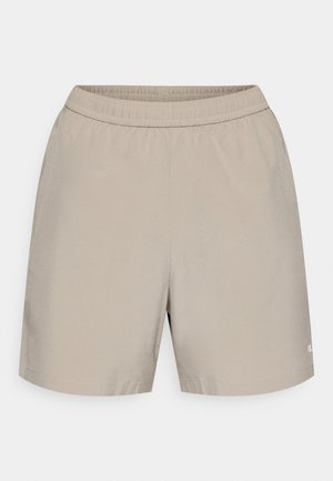 Bež kratke hlače iz lahkega blaga z elastičnim pasom. Imajo preprost dizajn in majhen logotip na spodnji strani.