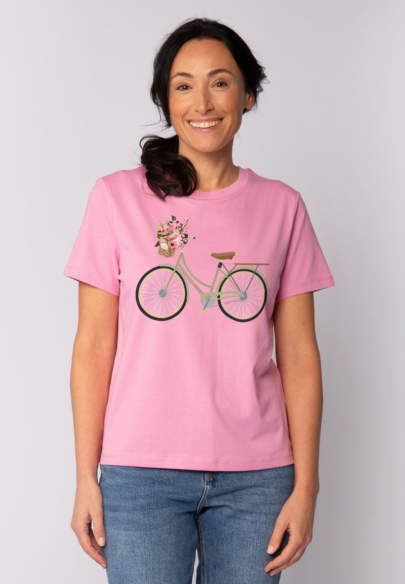 T-shirt en coton rose avec un graphique de vélo doté d'un panier à fleurs, à manches courtes et à coupe décontractée.