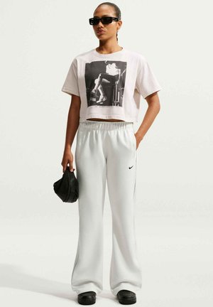 Nike Sportswear, NIKE SPORTSWEAR WOMEN'S MID-RISE SLIM KNIT TROUSERS SPORTSWEAR WINDRUNNER - Trainingsbroek - sail black black