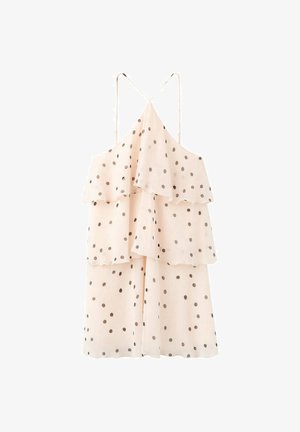 Robe sans manches crème à pois noirs, volants superposés et fines bretelles croisées aux épaules.