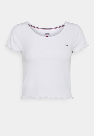 Biały prążkowany krótki top z krótkim rękawem, zakończony falistymi brzegami, z małym logo Tommy Jeans na piersi.