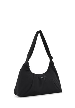 Sac à bandoulière noir Puma avec une large sangle ajustable et une fermeture éclair, avec un petit logo Puma au centre devant.
