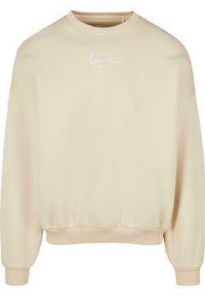 Beige Sweatshirt mit rundem Halsausschnitt, langen Ärmeln und gerippten Bündchen. Verfügt über ein weißes Logo auf der Brust und eine glatte, weiche Textur.