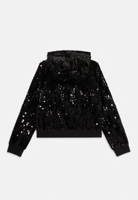 Felpa nera con paillettes, maniche lunghe, polsini e vita a costine, mostrata da dietro su uno sfondo bianco.
